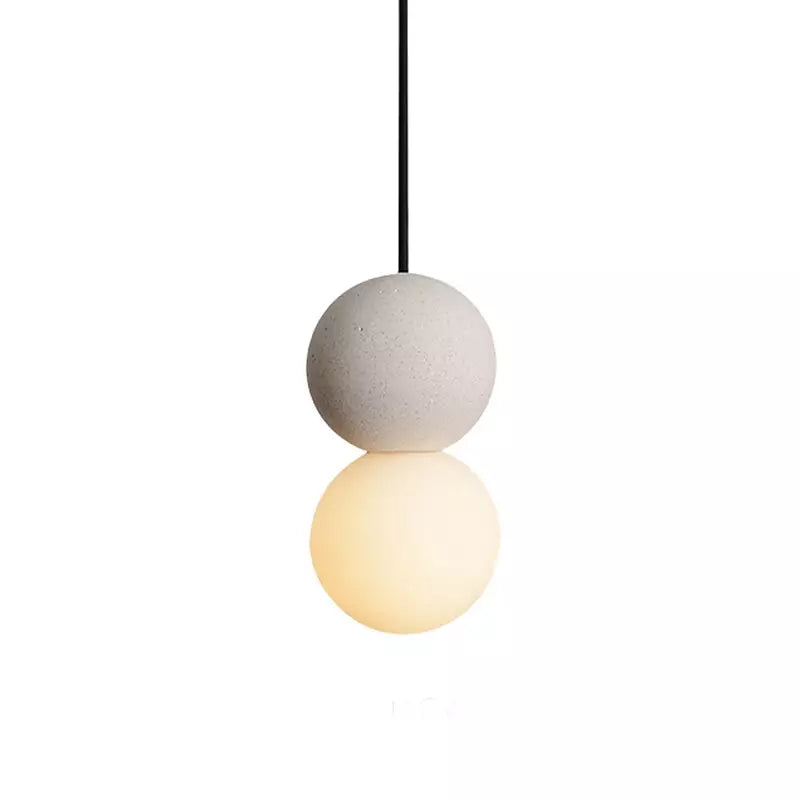 Suspension Origo – Design Géométrique en Pierre Volcanique et Diffuseur en Verre Opale