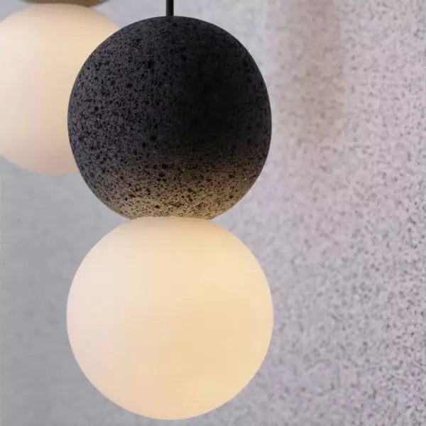 Suspension Origo – Design Géométrique en Pierre Volcanique et Diffuseur en Verre Opale