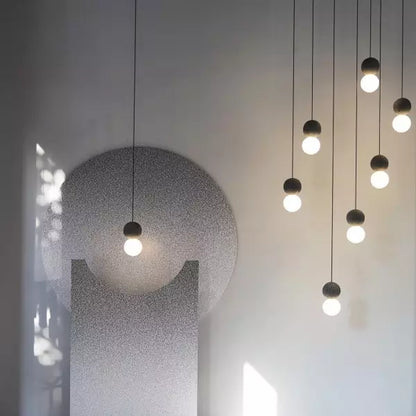 Suspension Origo – Design Géométrique en Pierre Volcanique et Diffuseur en Verre Opale
